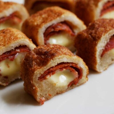 Rolled bread stuffed with pepperoni and cheese