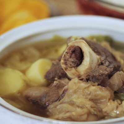 Boiled beef shank, marrow and vegetable soup (bulalo)