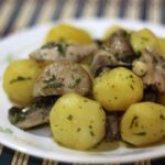 Chicken, baby potatoes and fresh mushroom salad