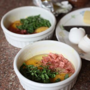 Adding Korean ham to eggs in ramekin