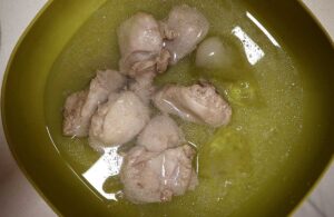 Poached chicken in ice bath
