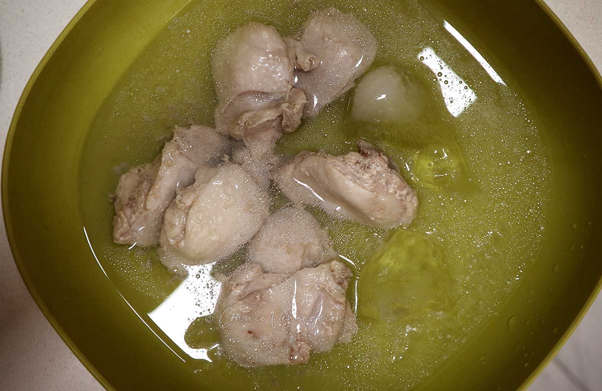 Poached chicken in ice bath