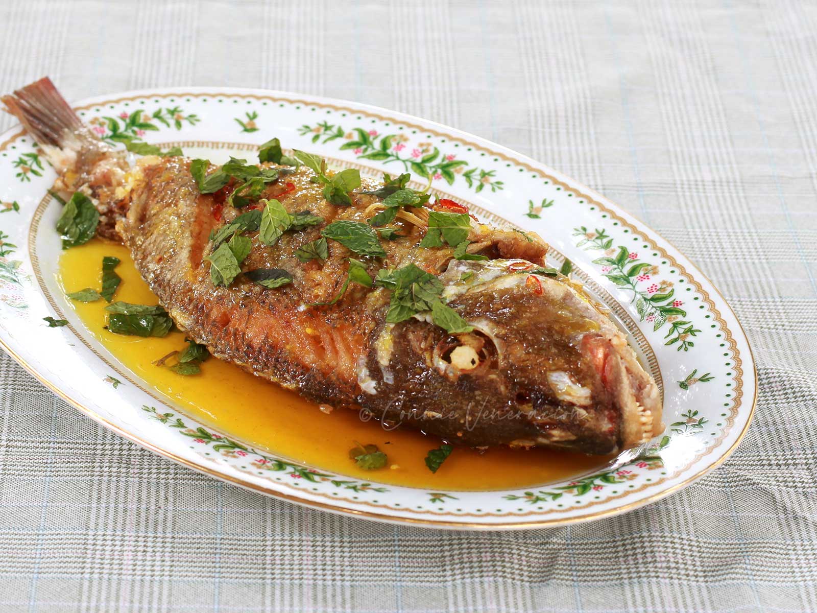 Crispy fried whole fish with lemon sauce