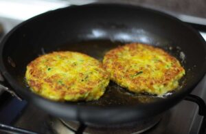 Frying Squash and zucchini pancakes