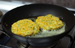 Frying Squash and zucchini pancakes
