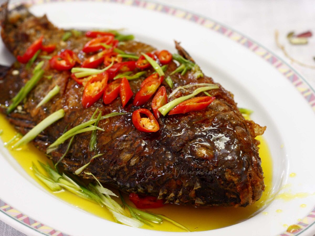 Crispy tilapia with calamansi and turmeric sauce