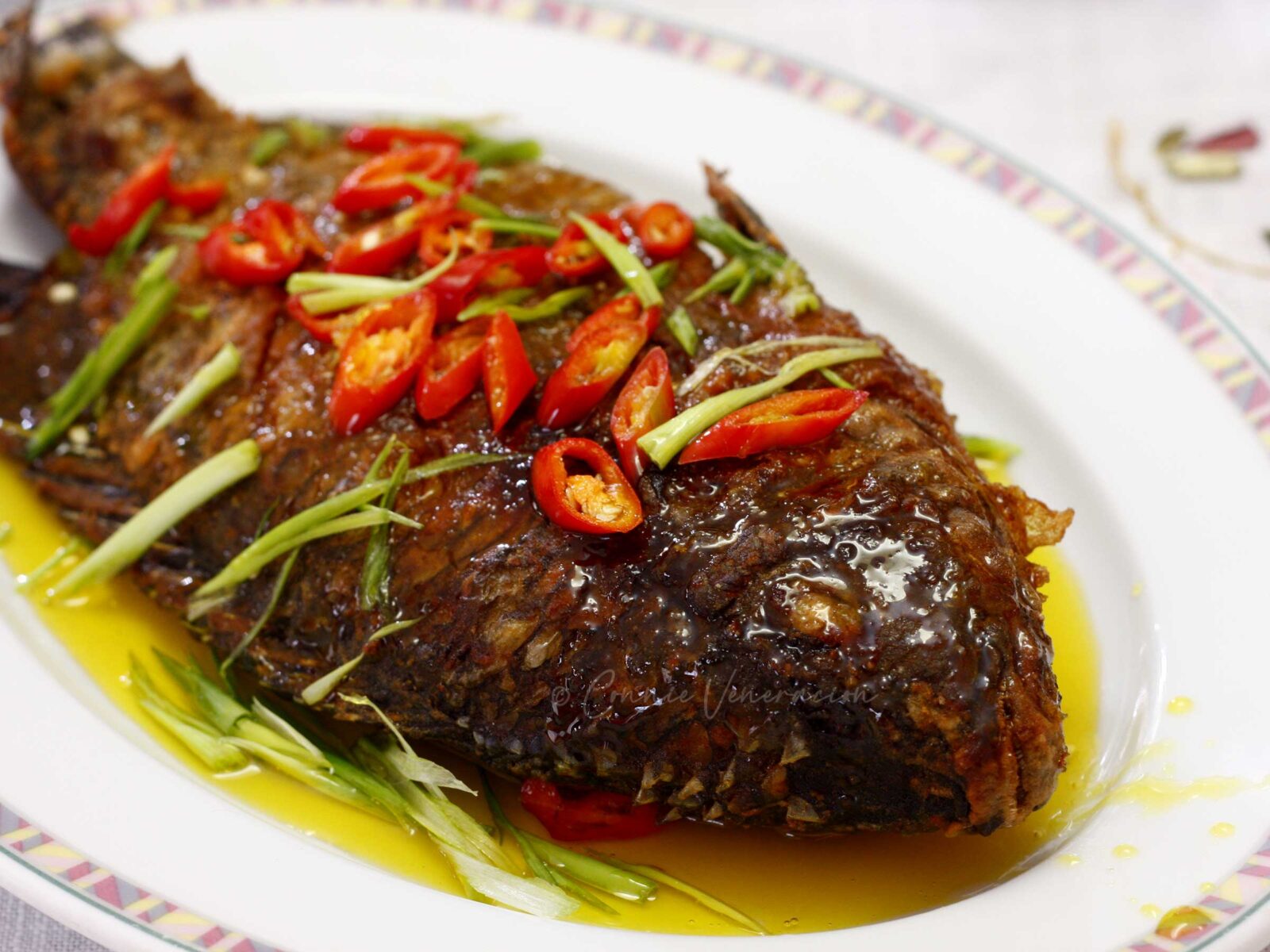 Crispy tilapia with calamansi and turmeric sauce