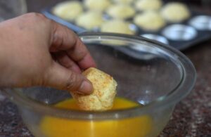 Dunking muffin in melted butter