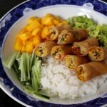 Smoked fish, salted duck eggs and tomato spring rolls