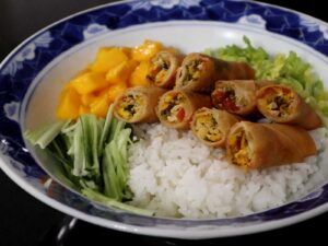 Smoked fish, salted duck eggs and tomato spring rolls