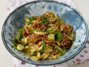 Pork udon with chili peanut sauce