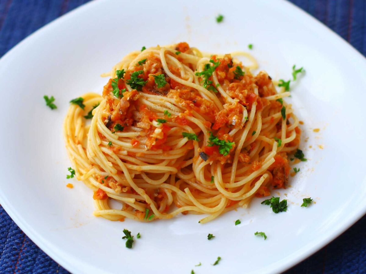Spaghetti with sardines in brandied tomato sauce