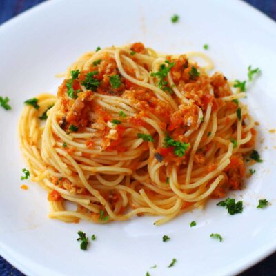 Spaghetti with sardines in brandied tomato sauce