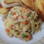 Browned sausage pasta with cream and cheese sauce