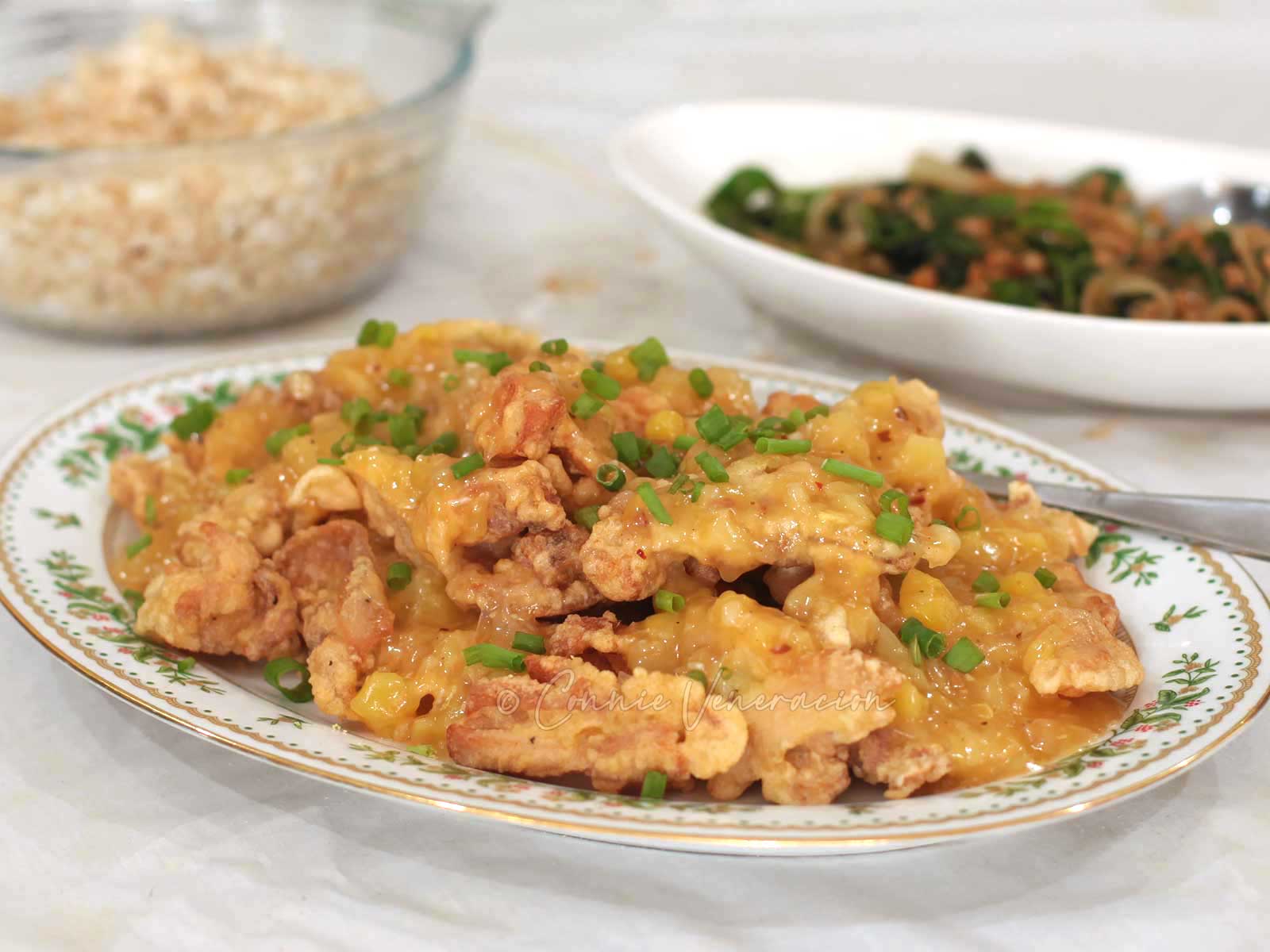 Crispy fried chicken fillets with pineapple sauce