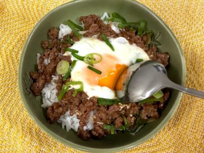 Shakshuka-style ground pork adobo and egg served over rice