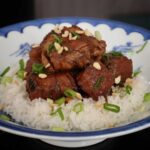 Pork and chicken adobo with sweet peanut butter sauce
