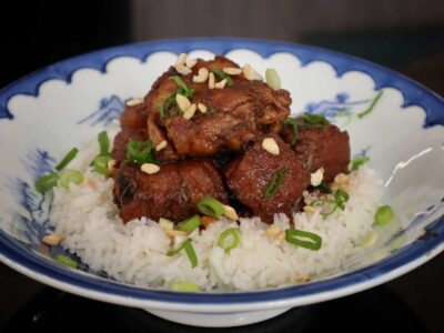 Pork and chicken adobo with sweet peanut butter sauce