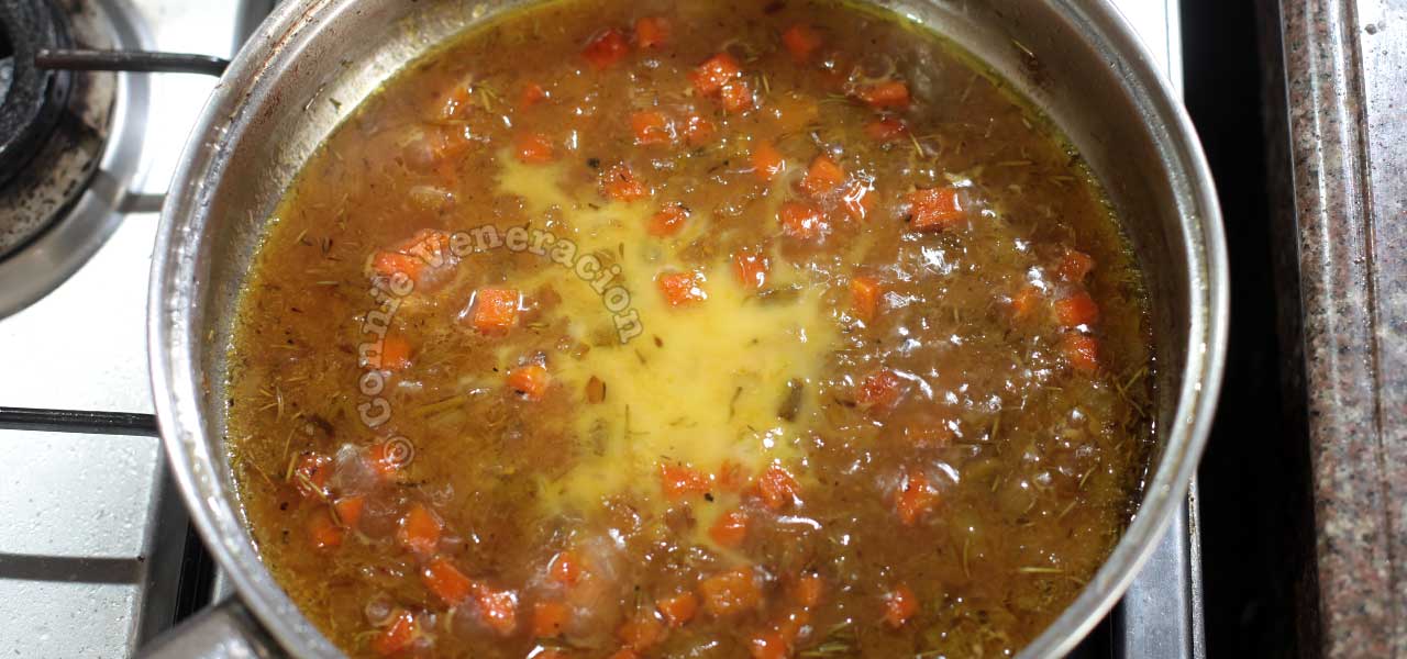 Pork rib chops braised in beer thickened cooking liquid