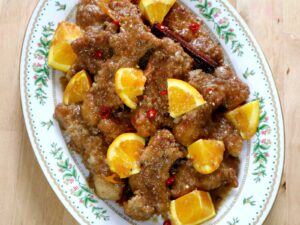 Baby back ribs braised in spicy orange sauce