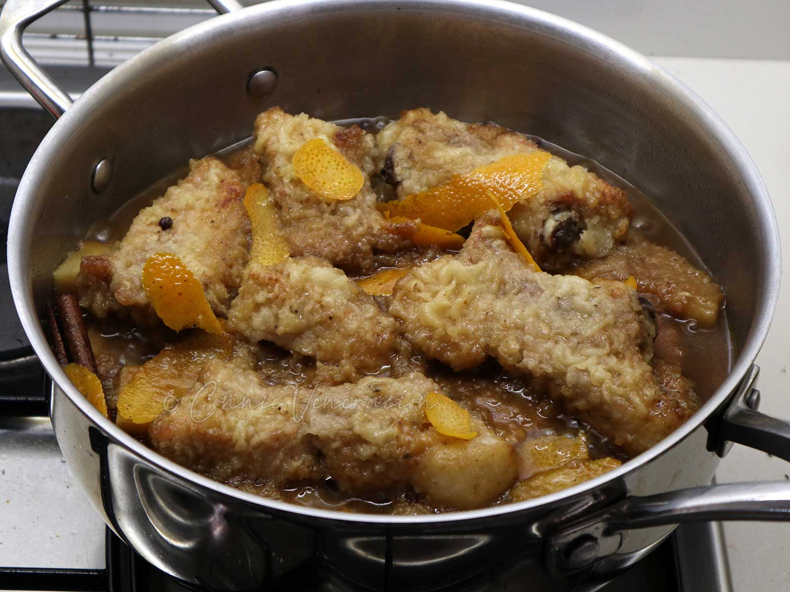 Baby back ribs braised in spicy orange sauce