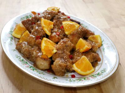 Baby back ribs braised in spicy orange sauce