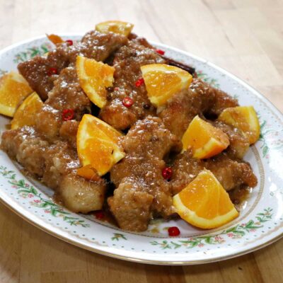 Baby back ribs braised in spicy orange sauce