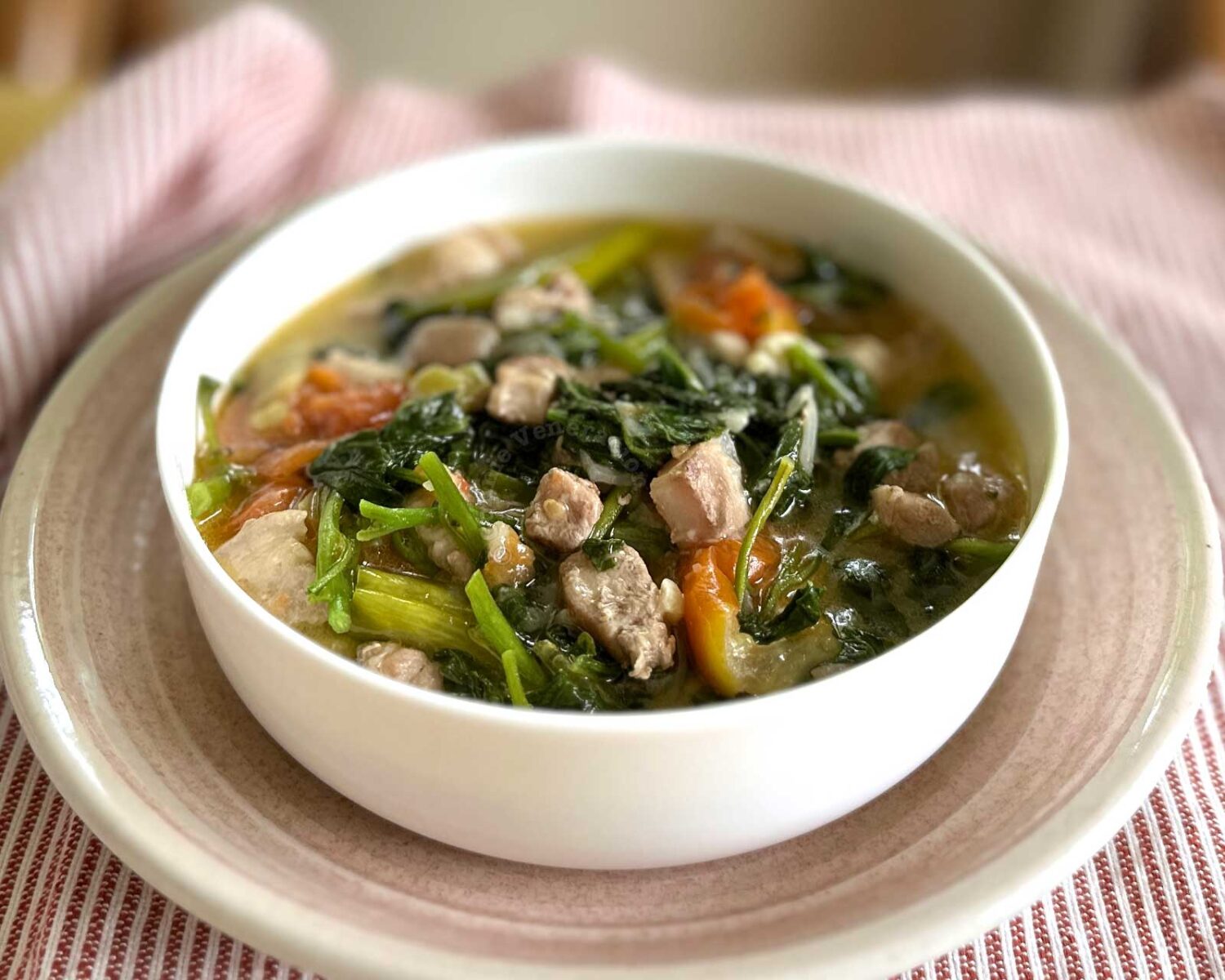Spicy pork belly, spinach and coconut cream stew