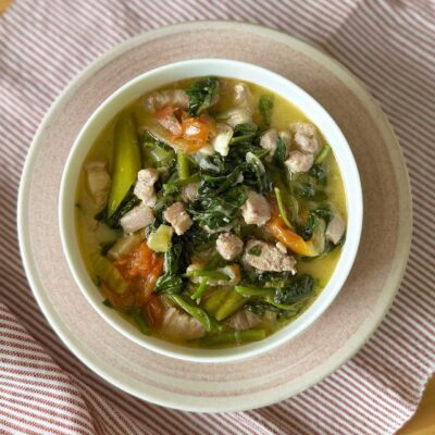 Spicy pork belly, spinach and coconut cream stew