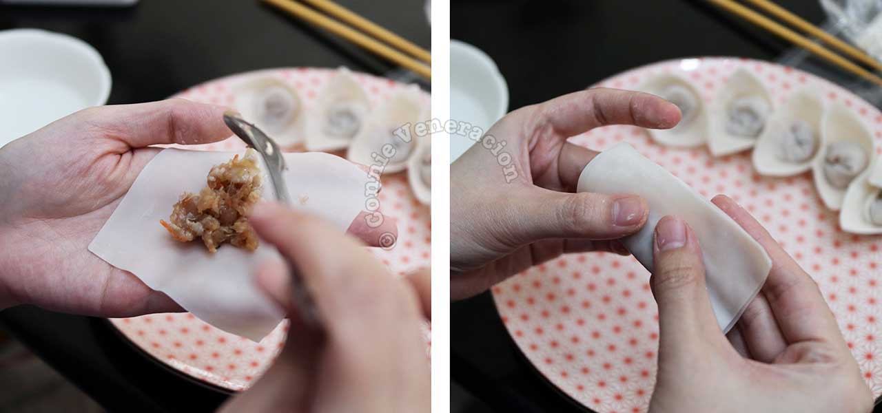 Filling wonton wrapper with minced chicken