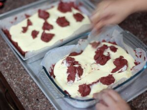 Swirling red velvet cheesecake squares