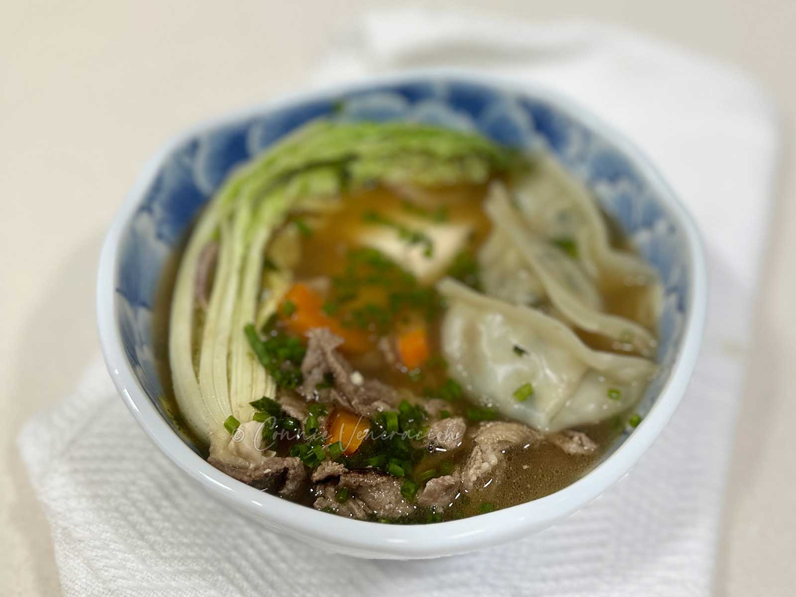 Pork, tofu and dumpling soup