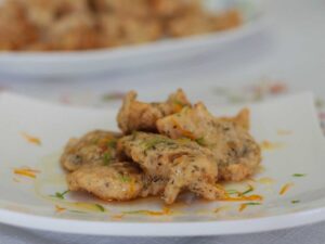 Crispy fish fillets with lime and orange sauce