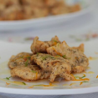 Crispy fish fillets with lime and orange sauce