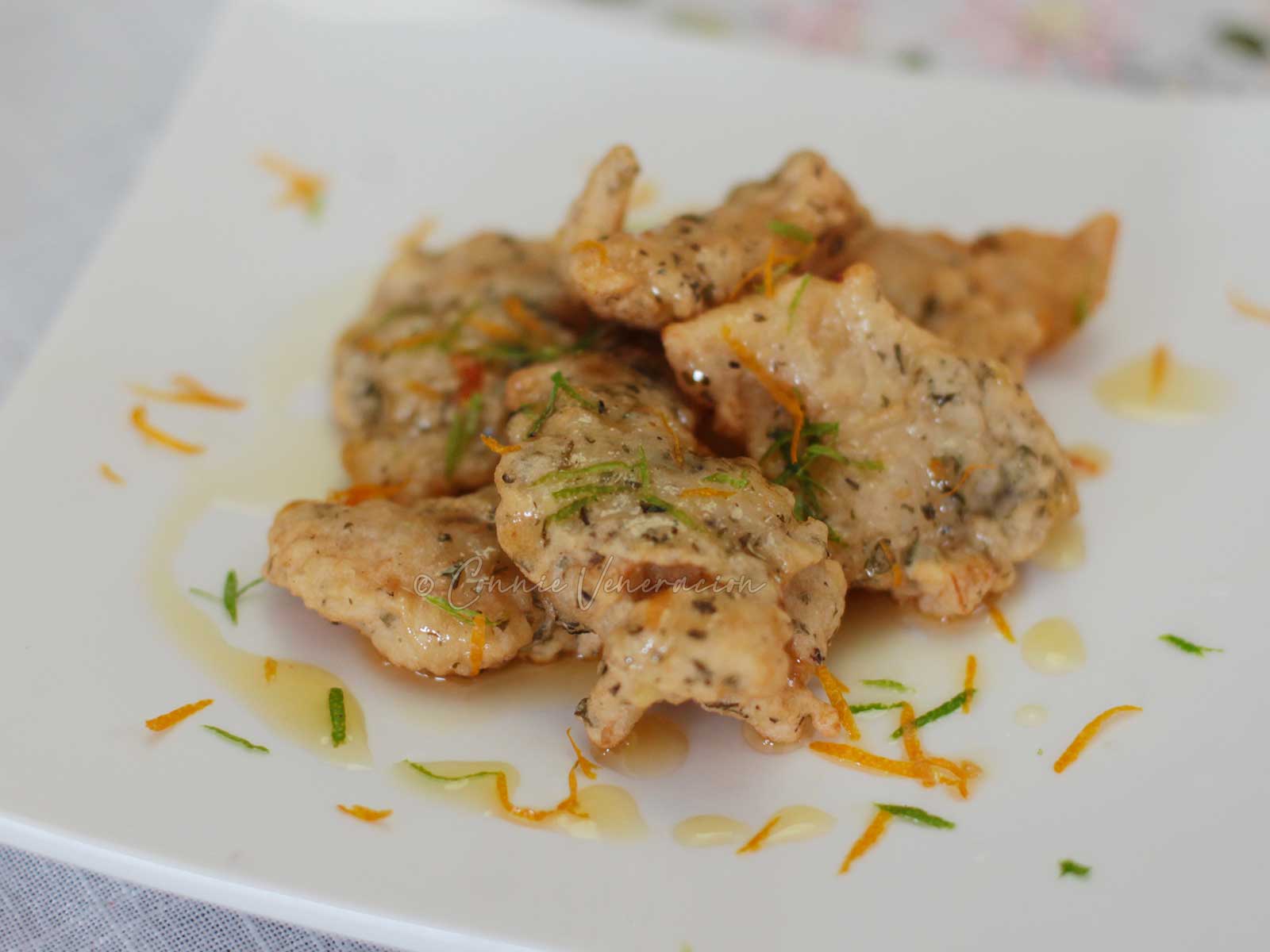 Crispy fish fillets with lime and orange sauce