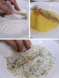Dredging fish fillet in flour, dipping in egg and coating with pako