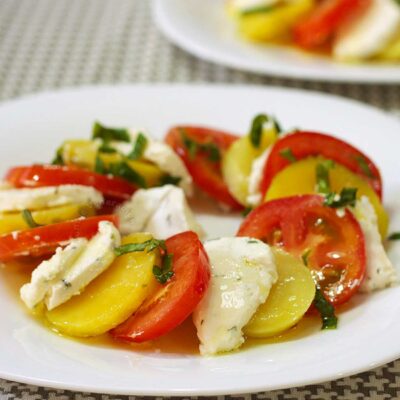 Potato and tomato salad with goat cheese