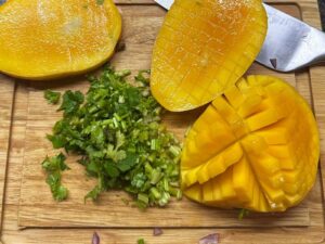 Chopped cilantro and cubed mango