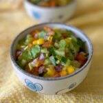 Sweet and tangy mango and tomato salad