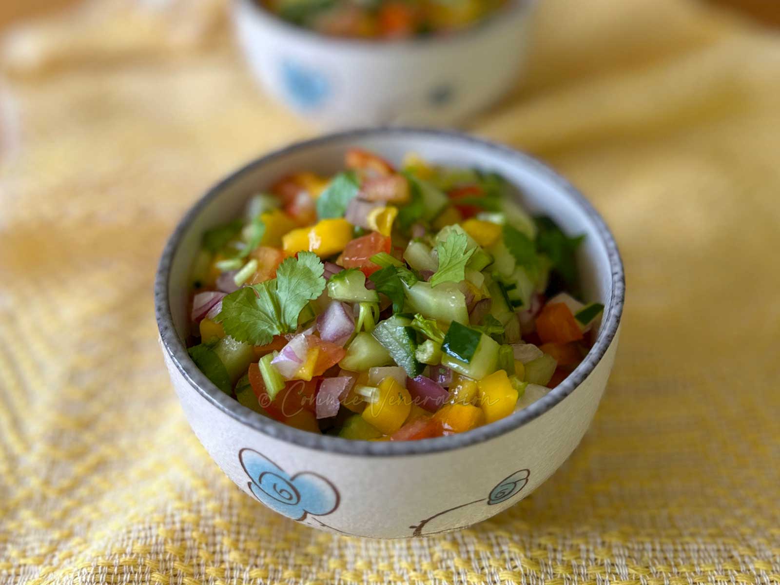 Sweet and tangy mango and tomato salad