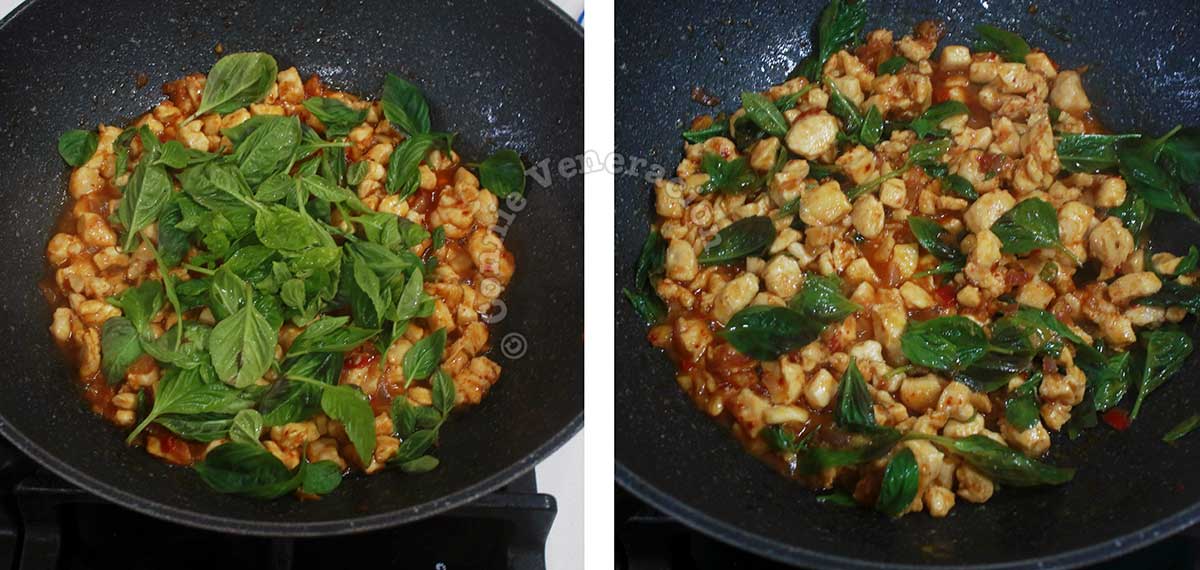 Adding Thai basil to chicken in pan