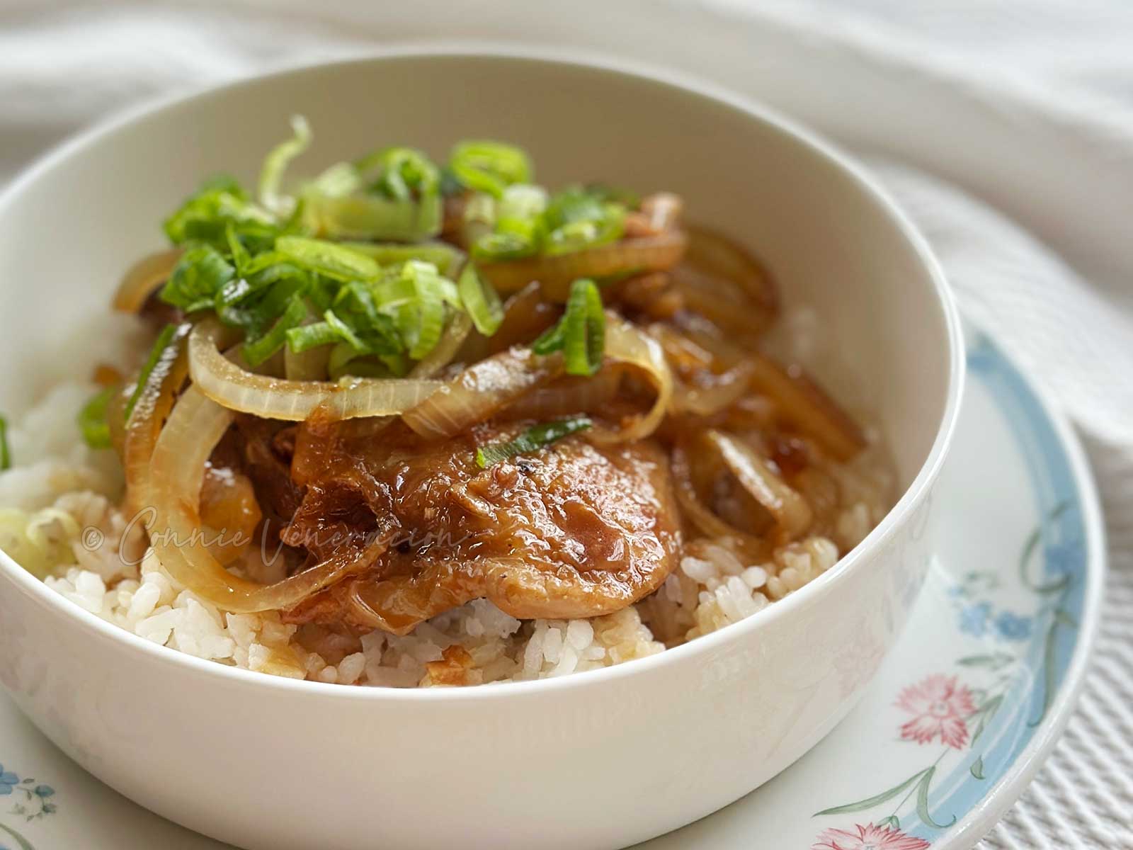 20-minute soy calamansi chicken served with onion rings and sliced scallions
