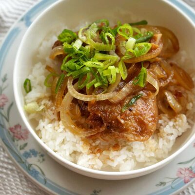 20-minute soy calamansi chicken served with onion rings and sliced scallions