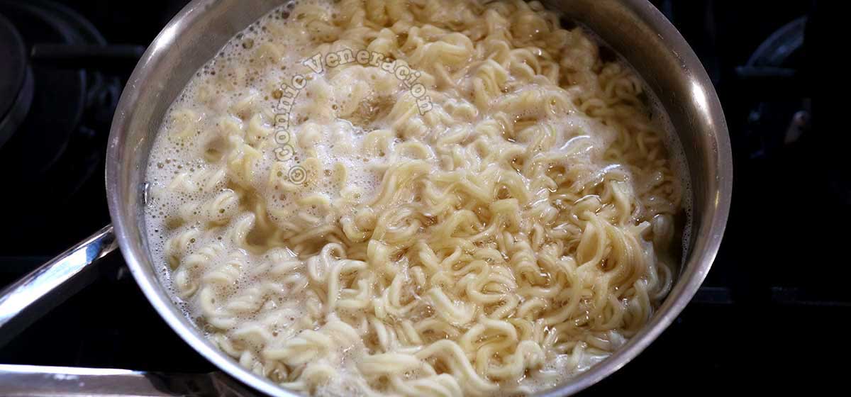 Boiling instant ramen in water