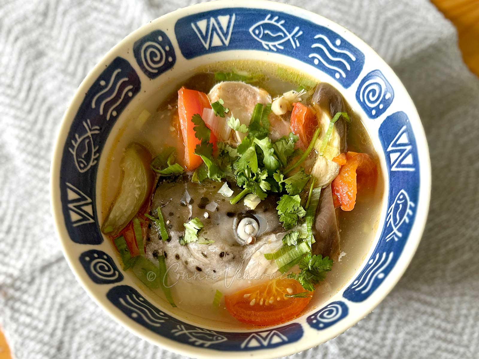Salmon head soup with lemongrass and ginger
