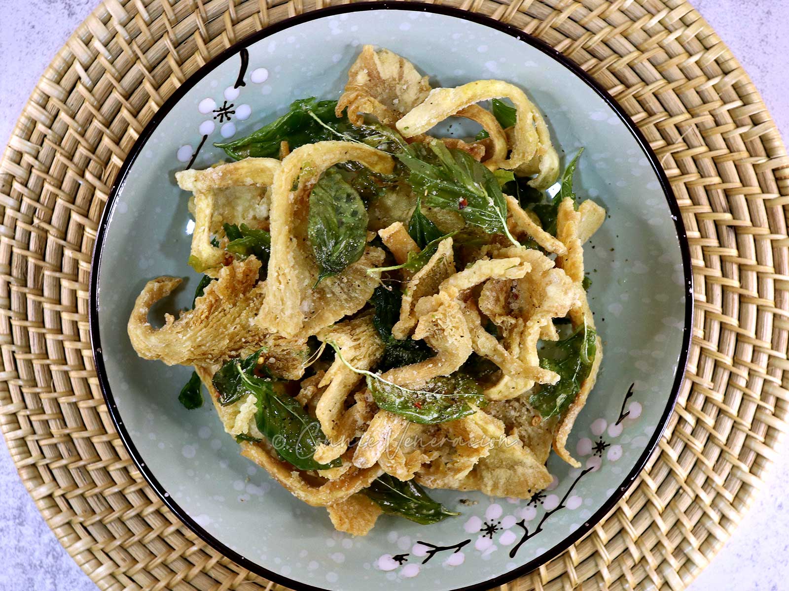 Crispy fried mushrooms and basil