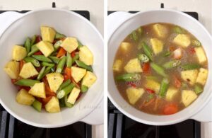 Simmering vegetables and pineapple in broth with tamarind juice