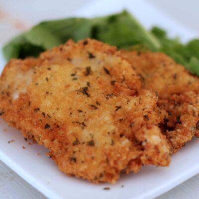 Chicken schnitzel with herbs and Parmesan