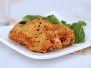 Chicken schnitzel with herbs and Parmesan