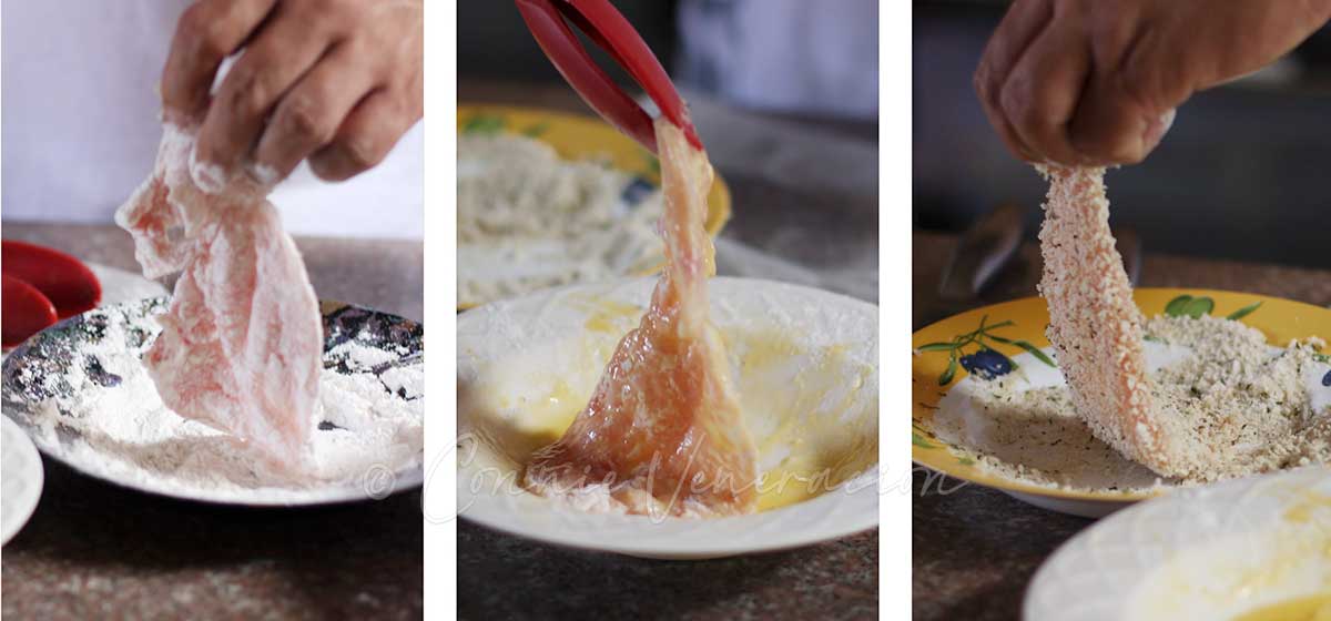 Dredging chicken fillet in flour, dipping in egg and coating with panko